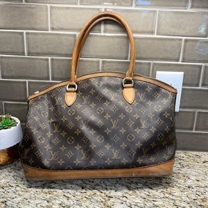 LOUIS VUITTON
Monogram Horizontal Lockit Bag